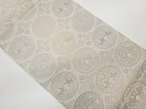 丸文に動物模様織出し袋帯